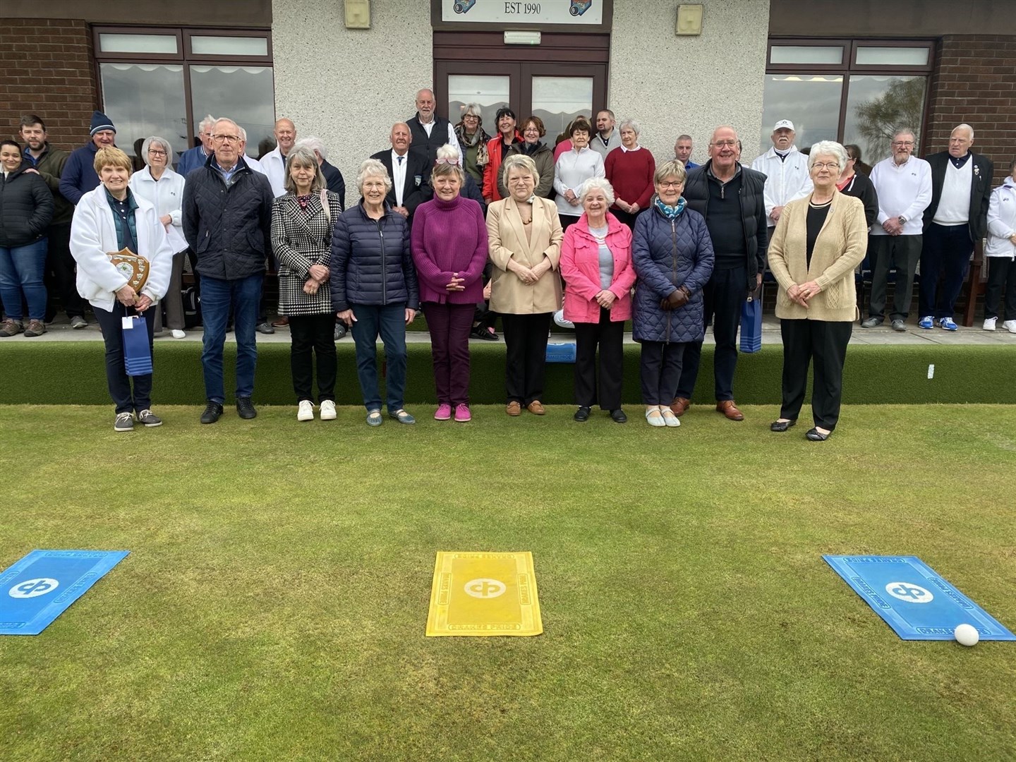 Pictured on the green are some family members of the founder members of the Conon Maryburgh Golf Club.