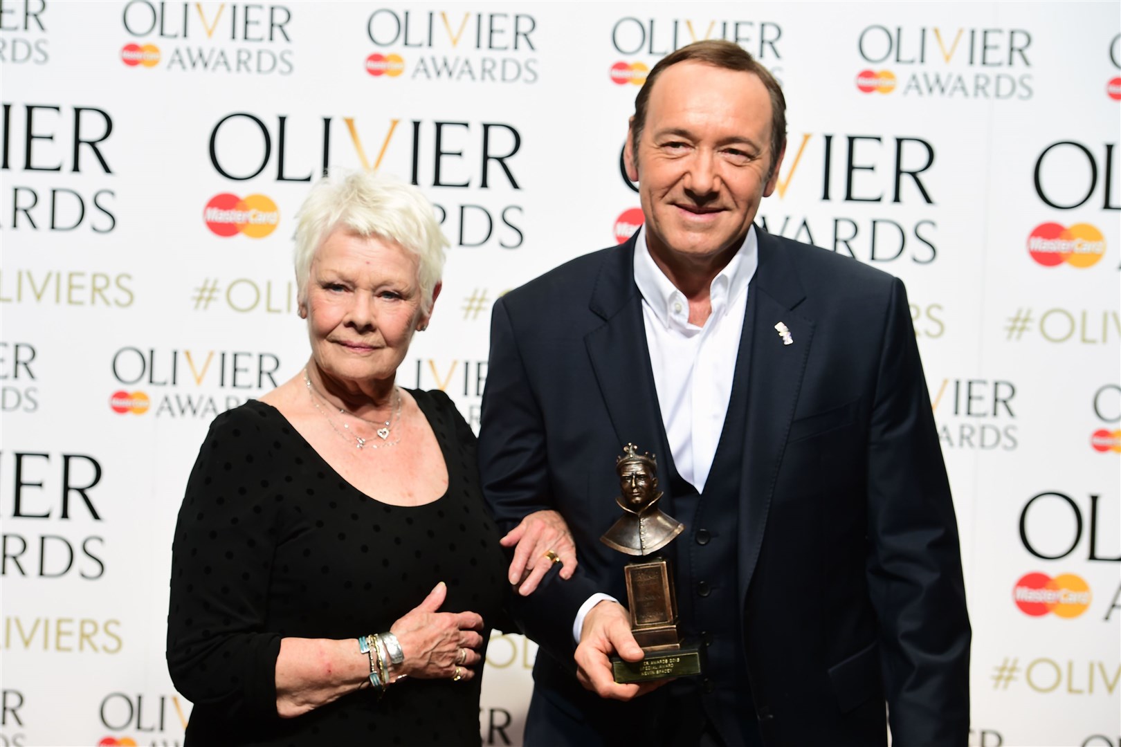 Dame Judi Dench and Kevin Spacey attending the Olivier Awards in 2015 (PA)