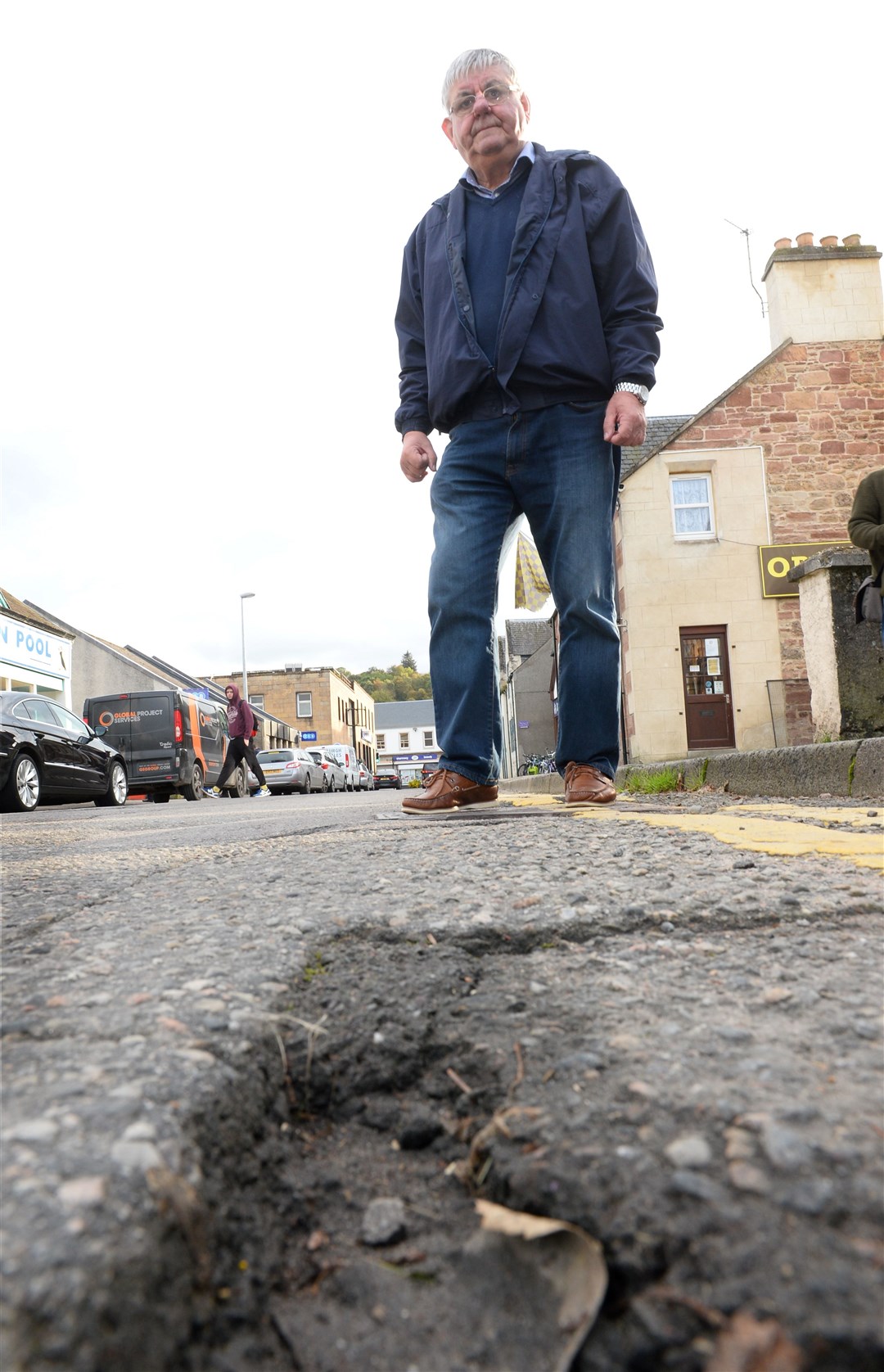 Cllr Graham MacKenzie at the junction of Tulloch St and Mart Road in Dingwall which is in need of resurfacing...Picture: Gary Anthony. Image No..