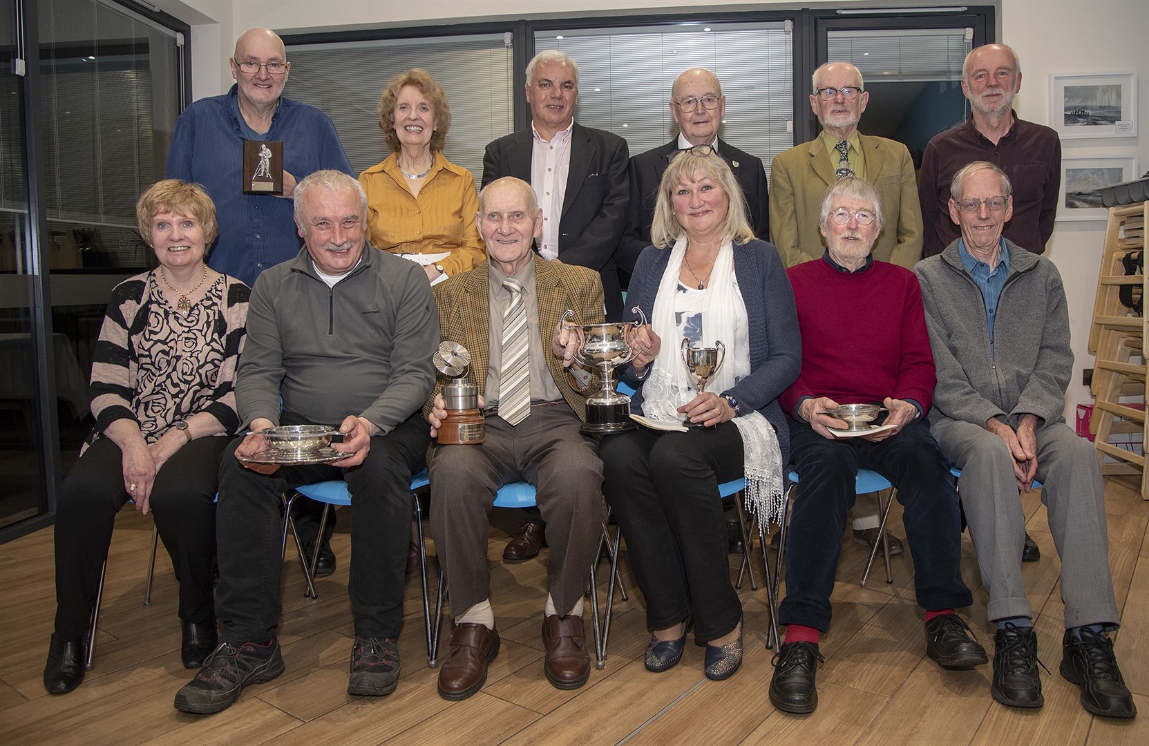Dingwall Camera Club Prizewinners Back (l to r) Brian Alexander, Pat Smith, Mark Janes, Willie Skinner, Sander Macdonald and Keith Barnes. Front (l to r) Joyce White, Iain Cathro, Donnie Smith, Bozent Kaljeta Summers, Andrew James and John Simpson. Pic - Phil Downie