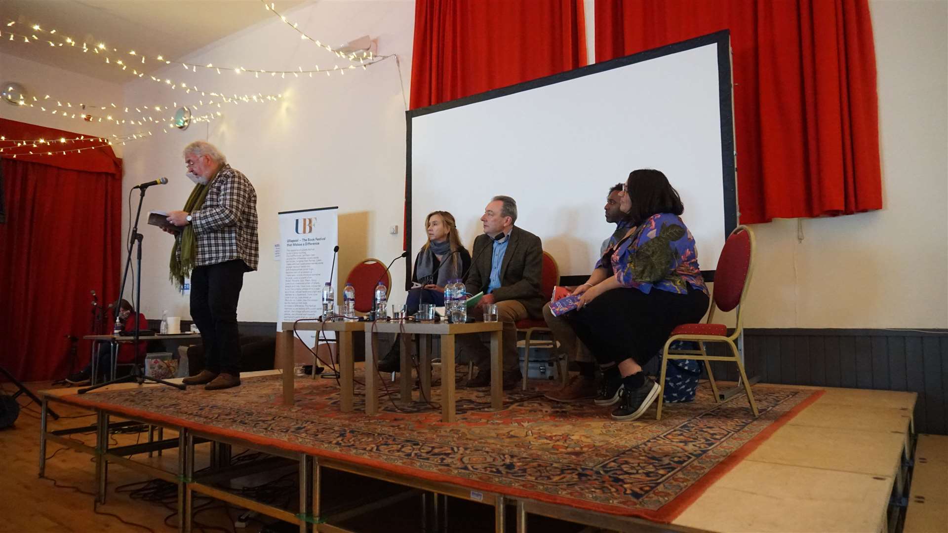 George Gunn reads one of his poems during the poetry talk with Triin Soomset, Ian Williams and Hannah Lavery, chaired by y Jim Carruth.
