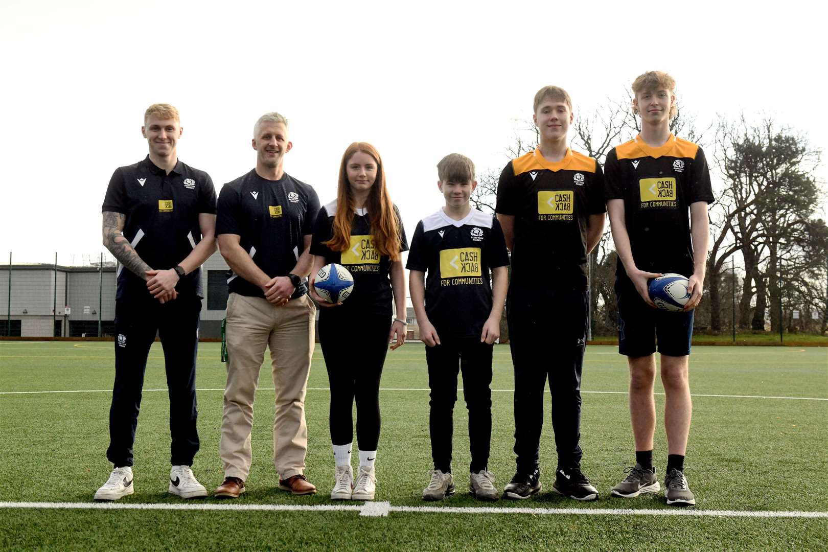 Michael McClenaghan, Ross Sutherland Rugby Club Cashback officer, Tom McGowan, headmaster, Jessica Peoples, Jack Noble, Eryk Buchwalk and Finn Kenny, pupils. Picture: James Mackenzie.