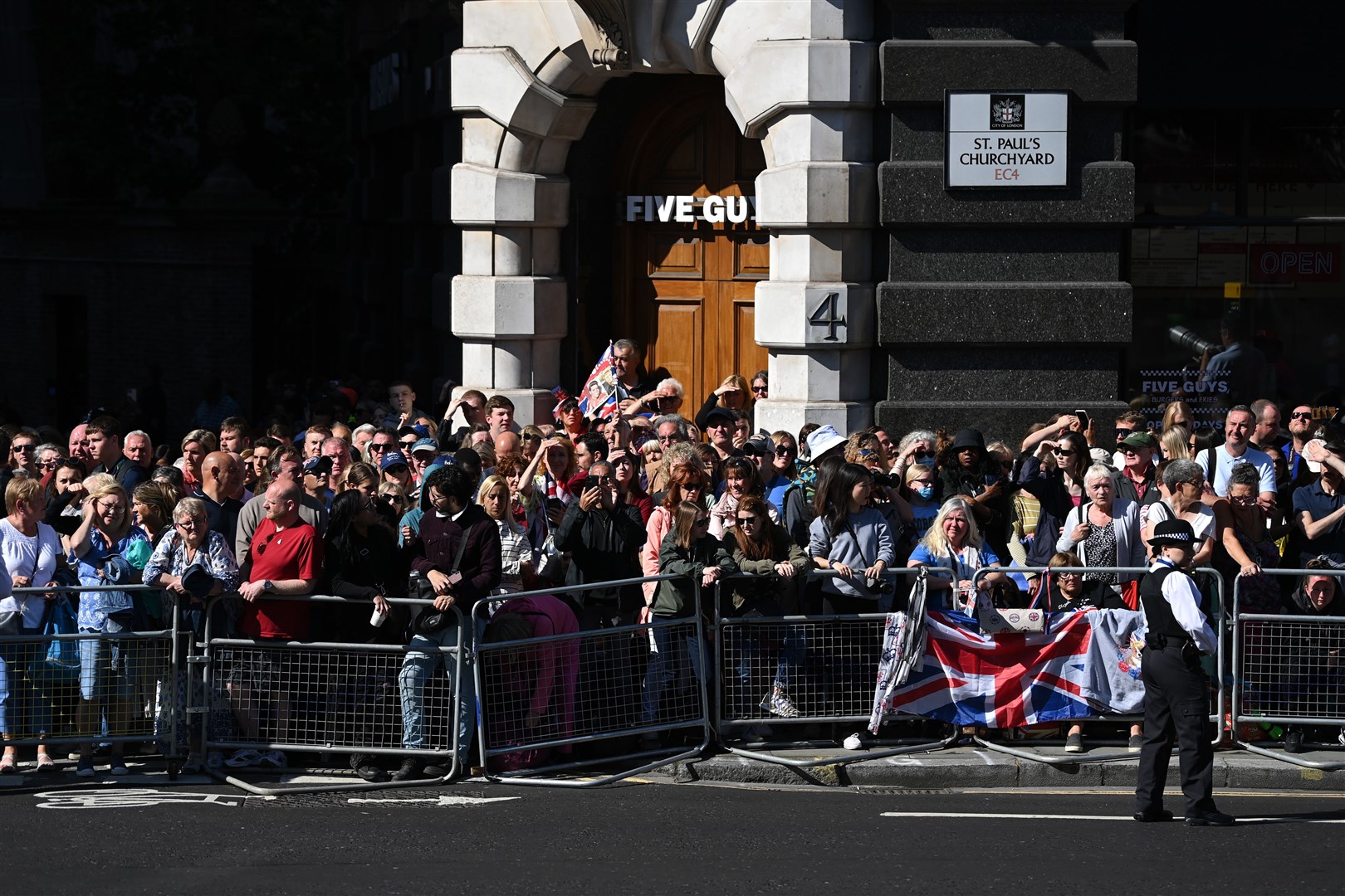 Wellwishers wait for the arrival of the royal family ahead of the National Service of Thanksgiving at St Paul’s (Daniel Leal/PA)
