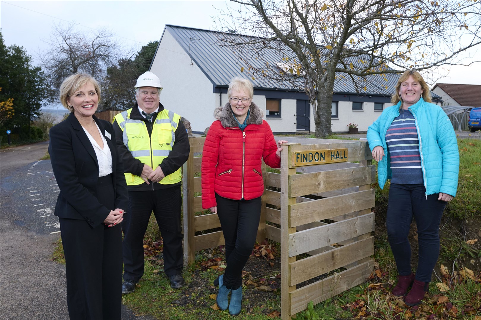 Hazel Bell and Jim Crawford, sales consultant and site manager of Tulloch Homes, with Barbara Gray and Sheila Robinson, treasurer and chair respectively of Findon Hall management committee