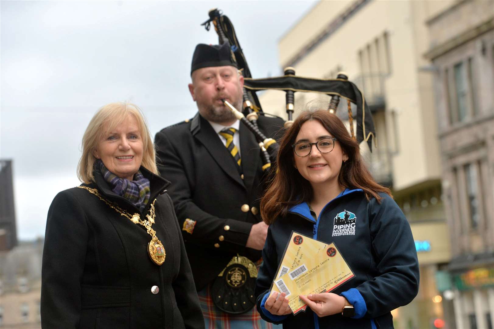 Inverness Provost Helen Carmichael, Scott Taylor (Pipe Major of the City of Inverness Pipe Band) and Caitlin Brown (Piping Inverness). Picture: Callum Mackay