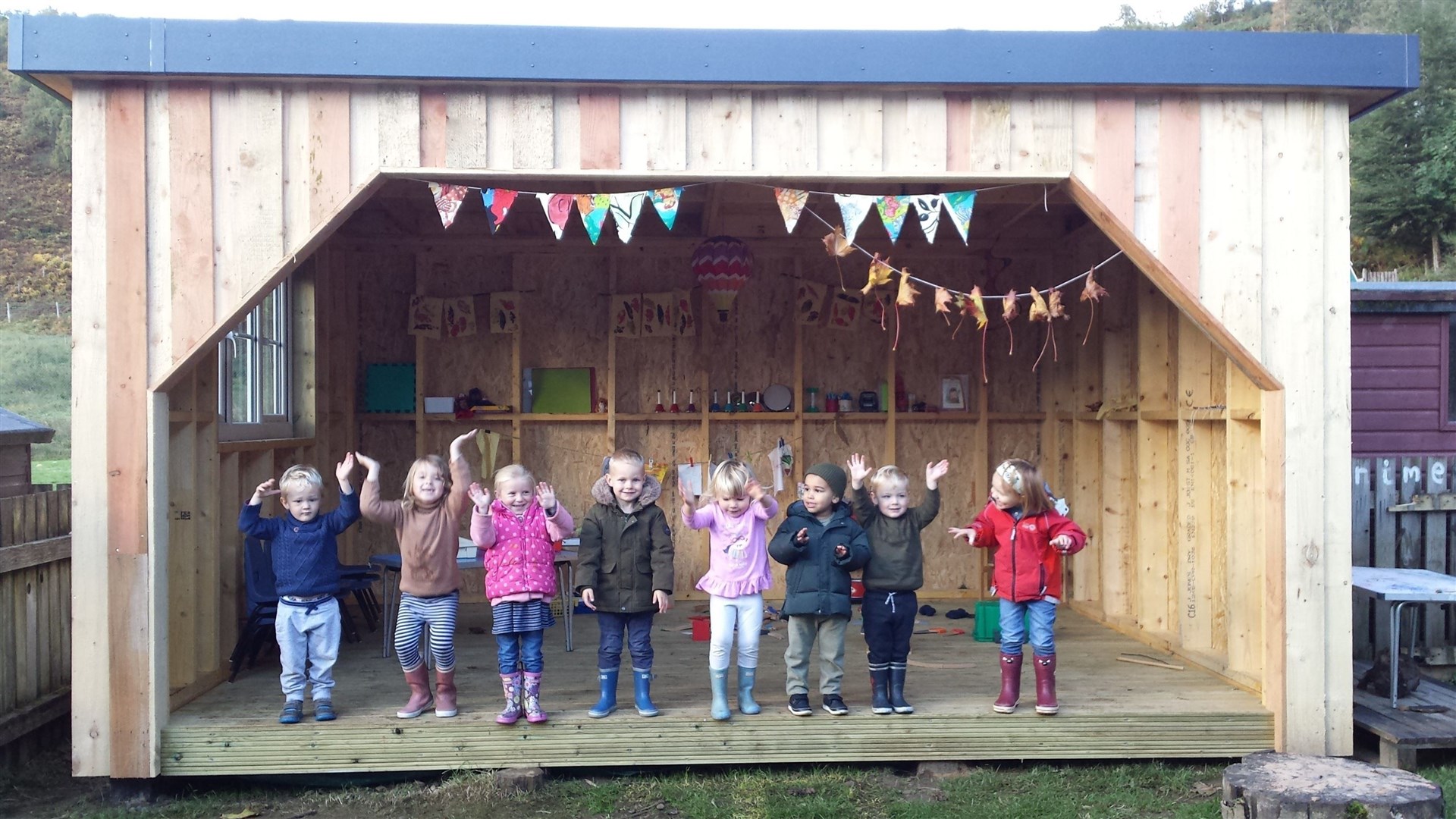 Teanassie children in new outdoor room.