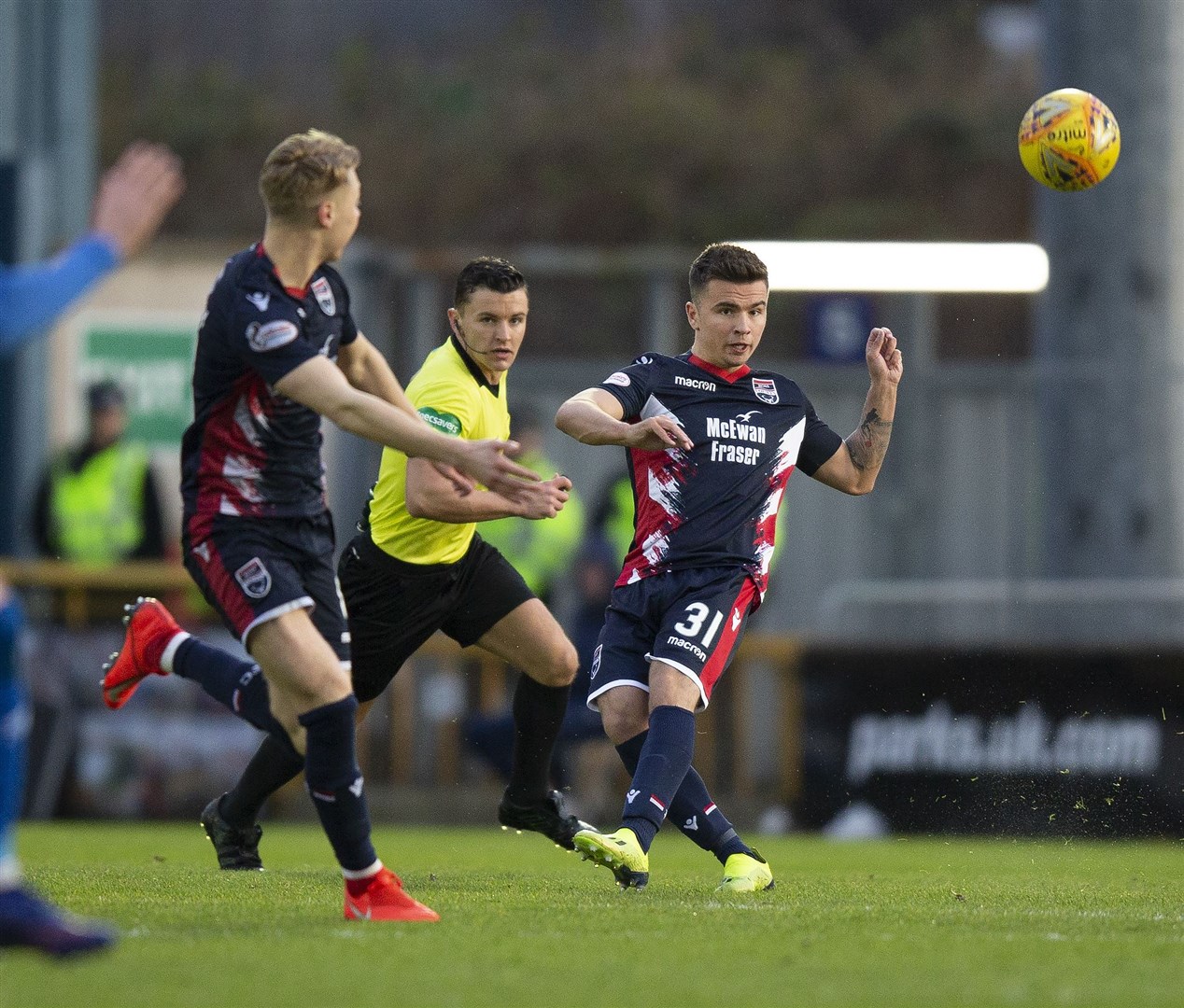 Ross County's Daniel Armstrong sets up the first goal in Tuesday night's Highland derby with this pass forward to Jamie Lindsay, before later setting up Josh Mullin. Picture: Ken Macpherson
