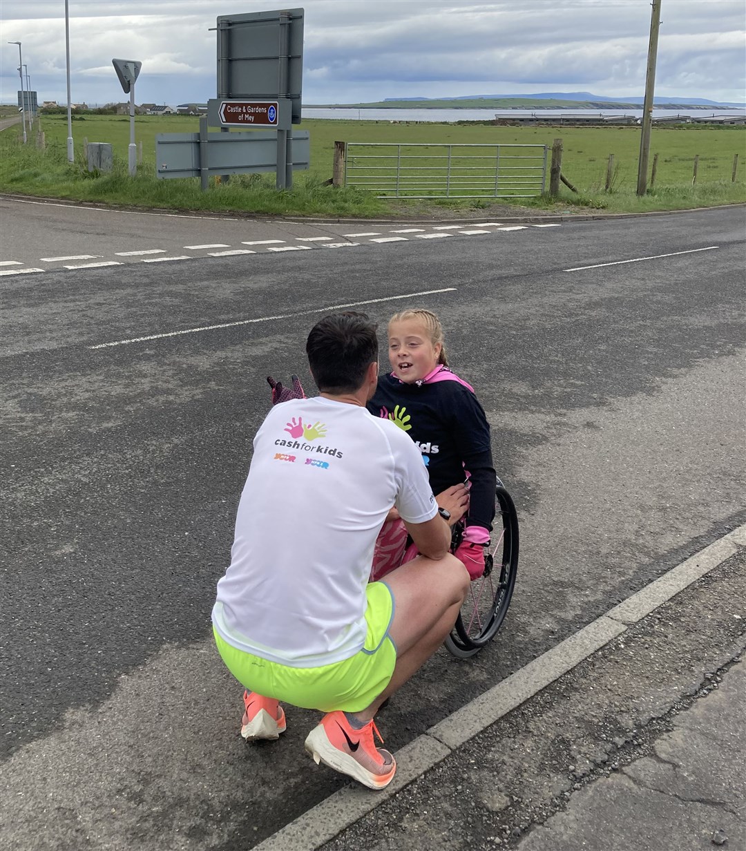 Steven has a chat with Pebbles at John O'Groats. Picture: MFR Cash for Kids