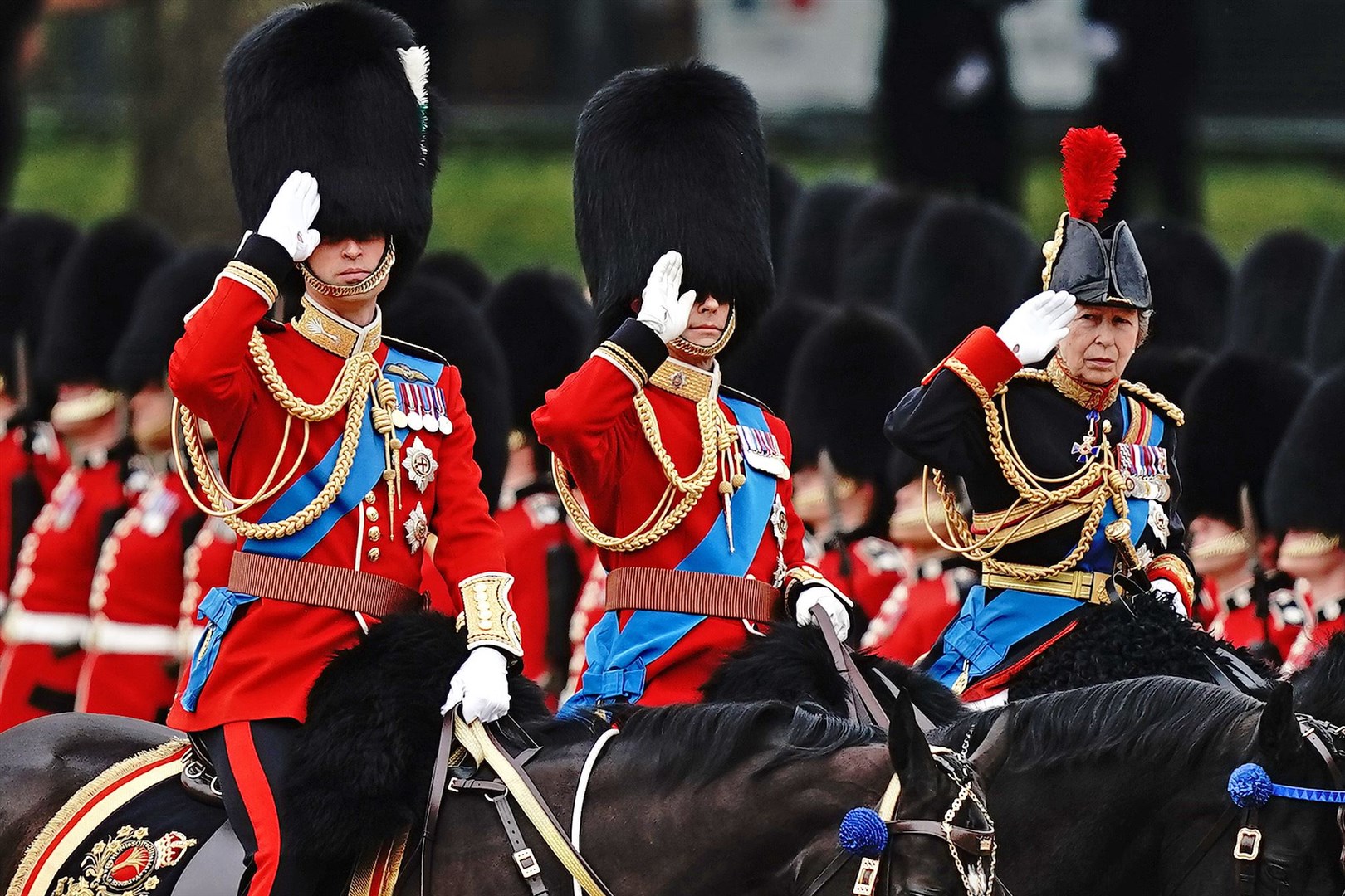The Prince of Wales, the Duke of Edinburgh and the Princess Royal salute (Aaron Chown/PA)