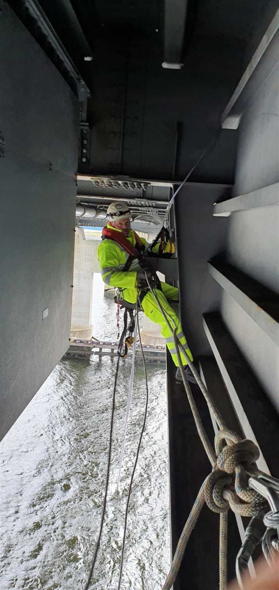 Contractors carried out the specialist repairs to the pipe which runs beneath the Kessock Bridge's road deck.