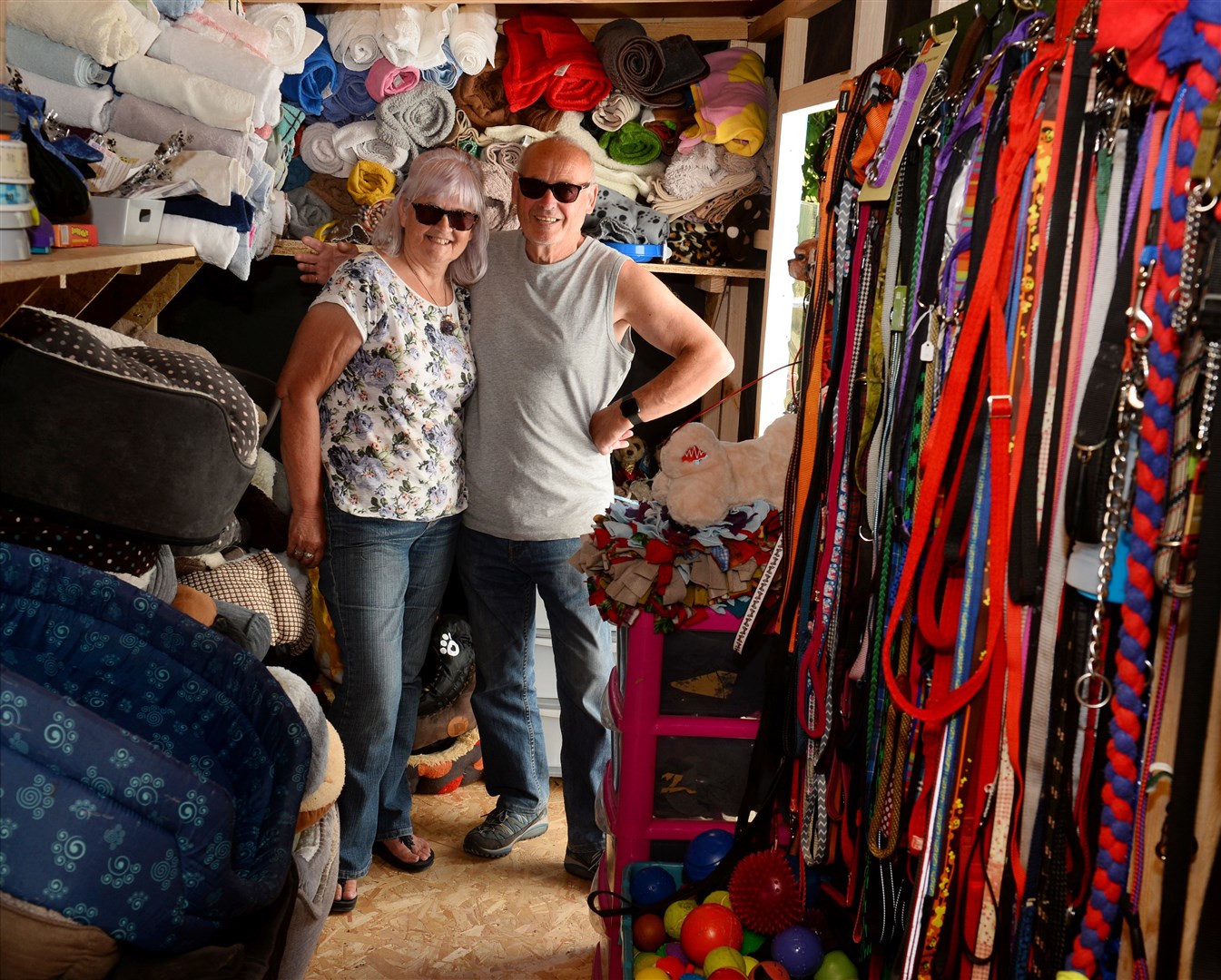 Bella's Bargains supremo Rhona Dalgarno and her partner Jimmy in the shed shop. They have helped fundraise thousands of pounds for Munlochy Animal Aid. Picture: Gary Anthony.
