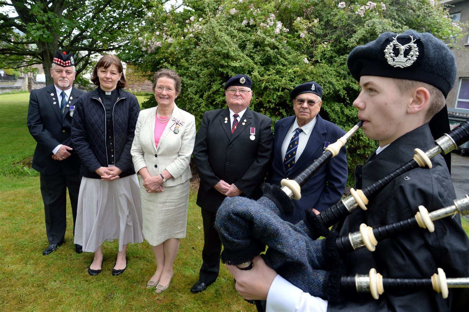 Pictured are (left to right) Morris Colven, secretary RBLS Dingwall, Rev Julia Boothby, Lord Lt Janet Bowen, Fraser Campbell, chairman RBLS Dingwall , Ron Gomez , chairman RBLS Invergordon and piper Ruaraidh Drennan (13). Picture: Gair Fraser. Image No. 044230
