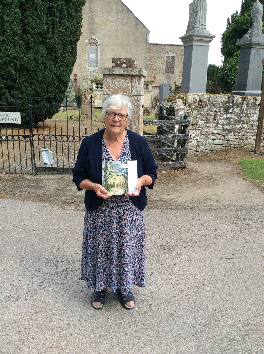 Catriona Fraser with the book, set for an official outdoor launch on Saturday, July 31.