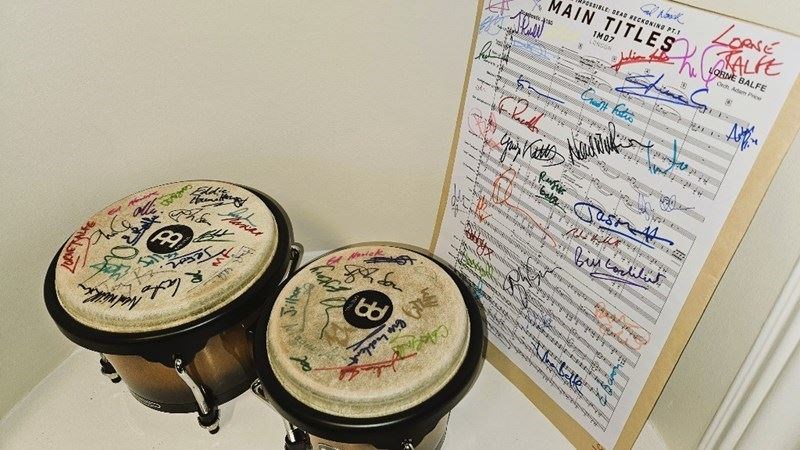 The signed bongo drums used during recording sessions for the soundtrack of the latest MIssion:Impossible film.