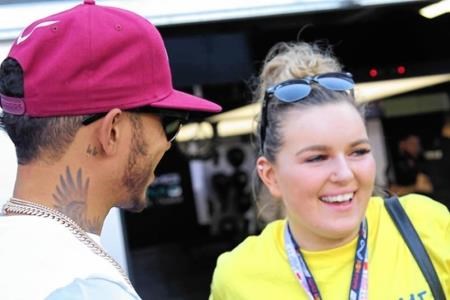 Polly meets her hero, crack Formula One racer Lewis Hamilton