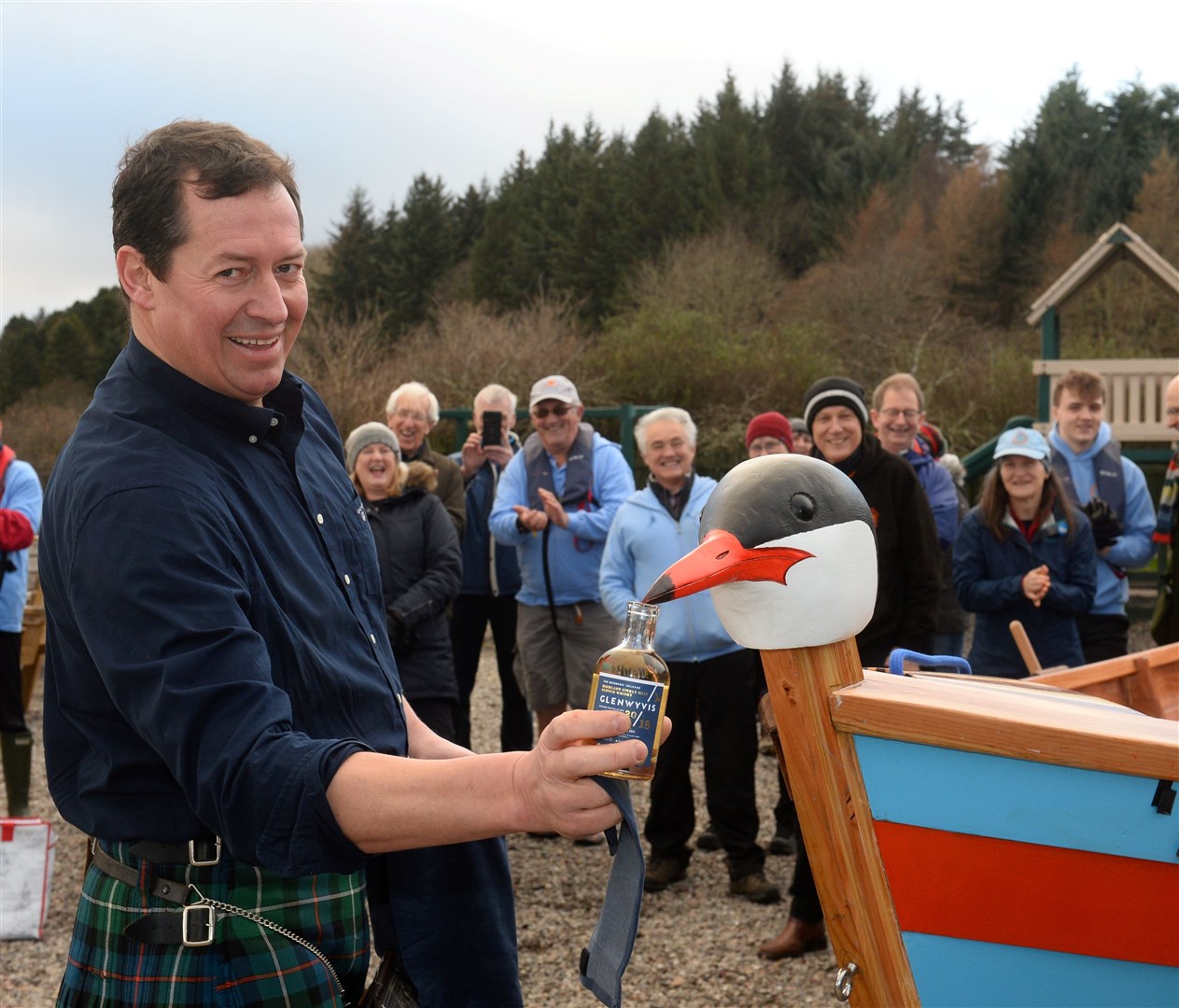 Quintin Stevens blessing the skiff with a dram. Picture Gary Anthony.