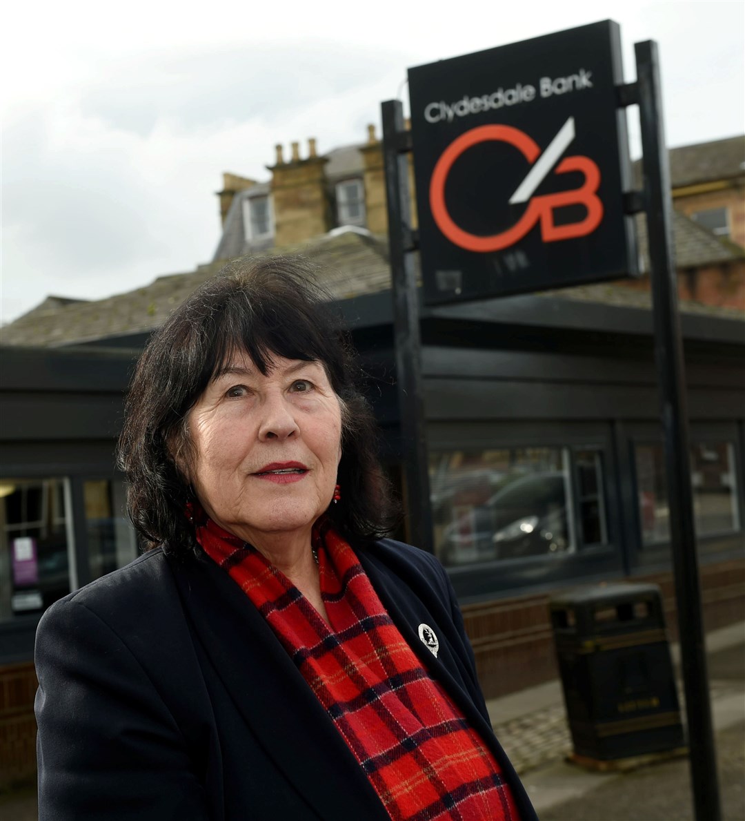 Margaret Paterson outside the Dingwall branch of the Clydesdale bank which is due to close on June 1....Picture: Callum Mackay..
