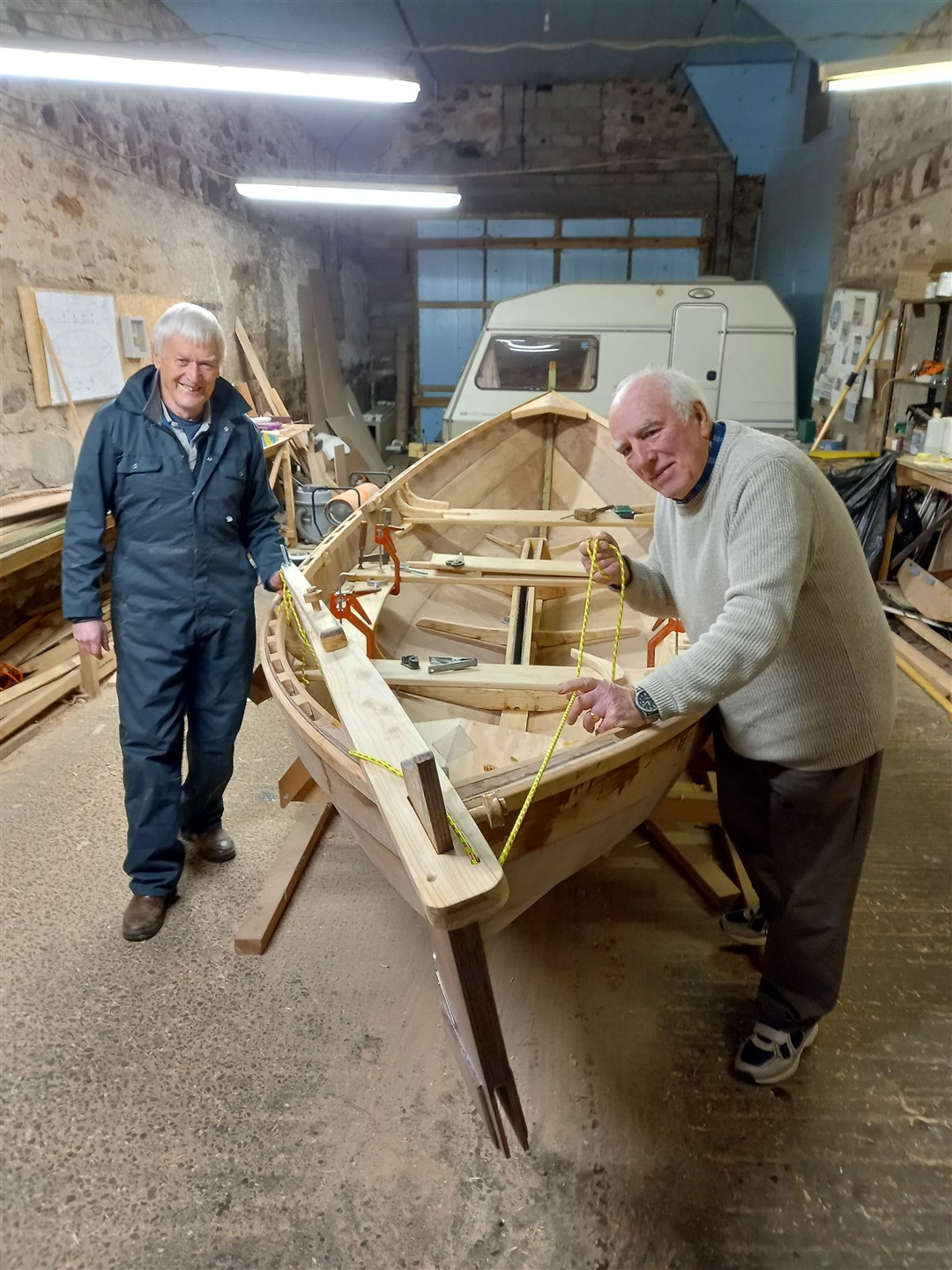 Angus Macinnes and Michael Dickerson busy building a Ness Yoal at Brahan steading.