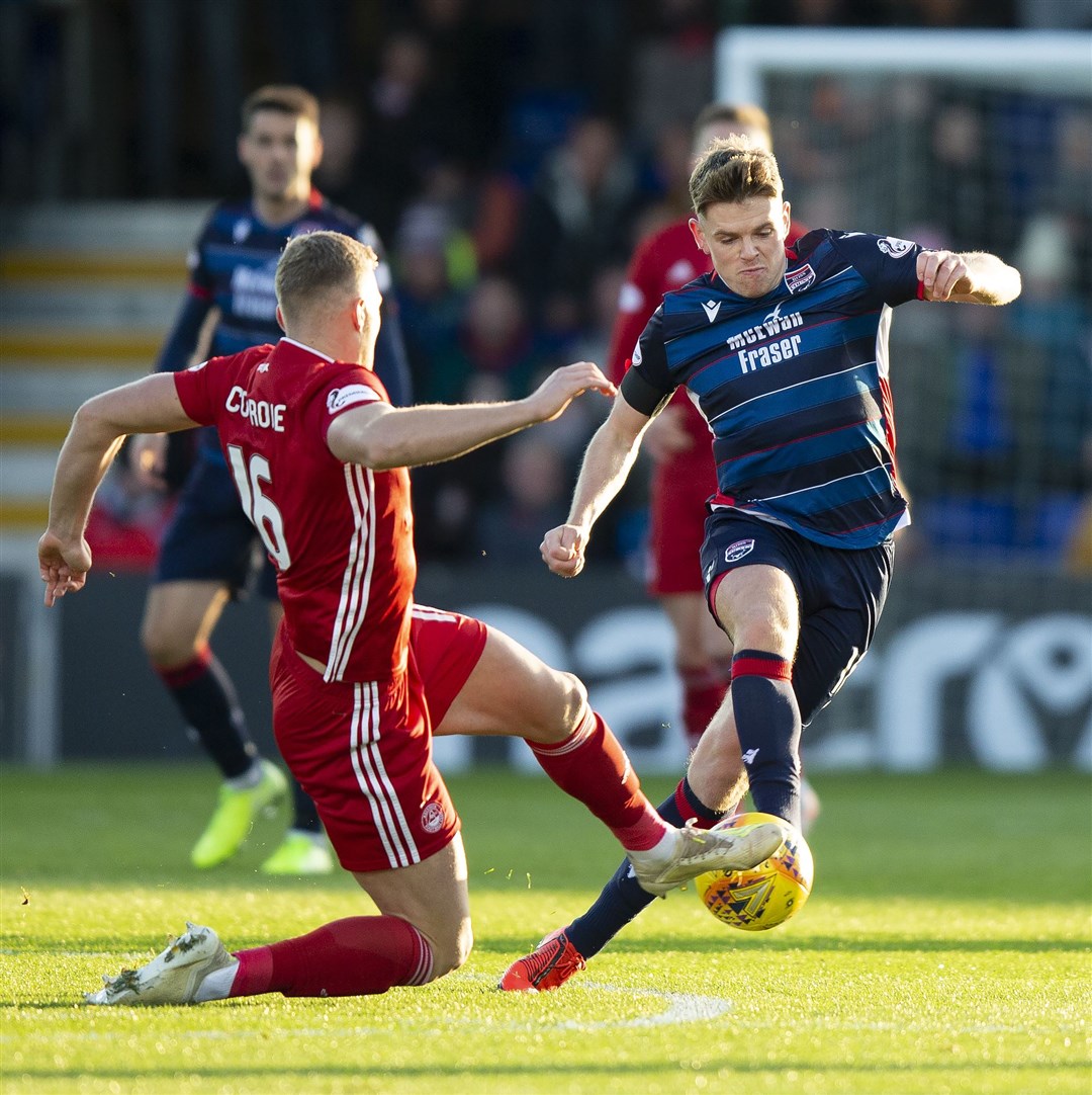 Ross County's Lewis Spence takes the ball forward against Aberdeen in a Premiership match last month. Picture: Ken Macpherson