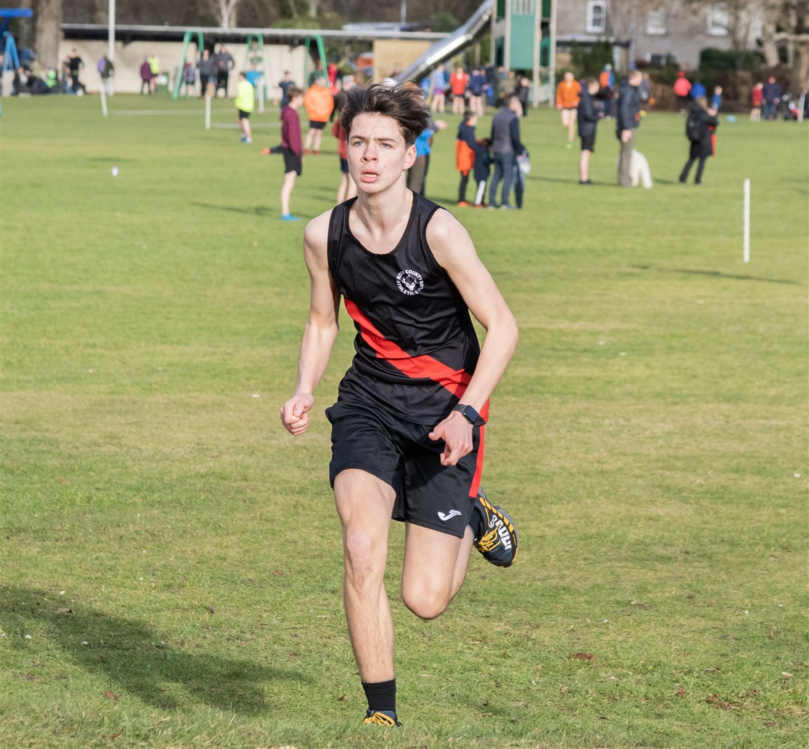Andrew Baird from Ross County Athletics Club leading the Under 15 Boys race at Grant Park's Cross Country course in Forres...Picture: Beth Taylor.