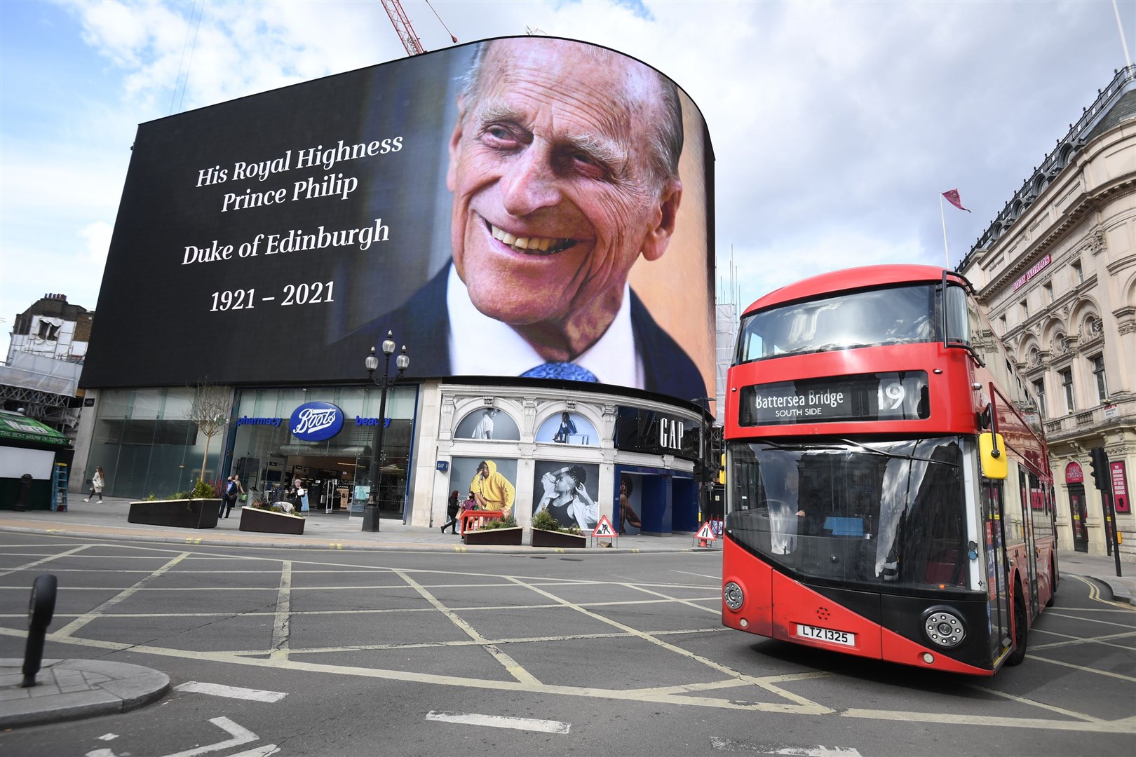 A tribute to the Duke of Edinburgh, which will be shown for 24 hours, on display at the Piccadilly Lights in central London (Kirsty O’Connor/PA)