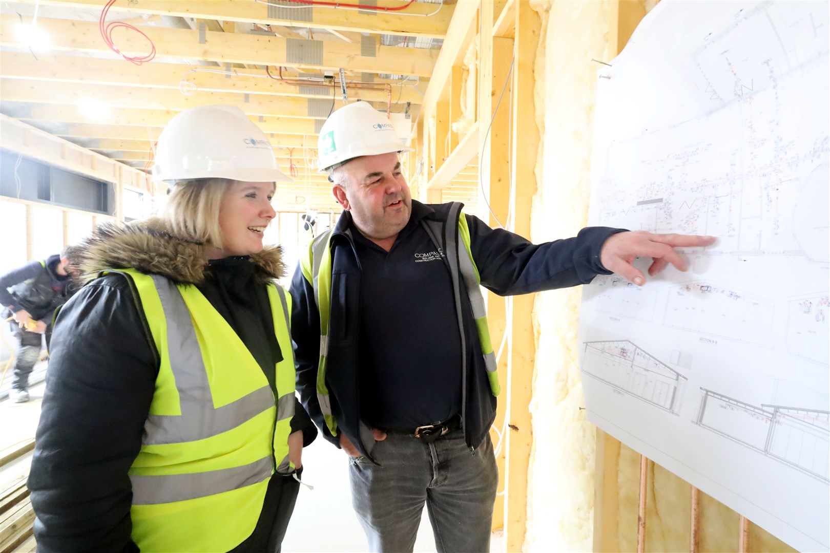 Kirstin Mackay, programme manager of the Elsie Normington Foundation, discusses the plans with site manager Greg Cooper.