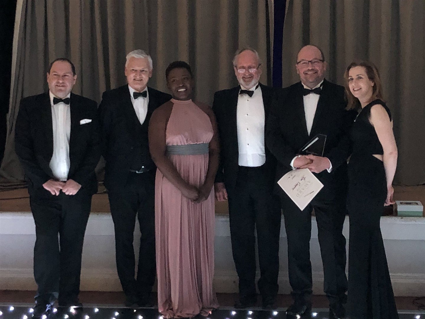 Ron Coggins (second from right), a surgeon from Raigmore Hospital, was presented with the Silver Scalpel award. The award marks excellence in training.