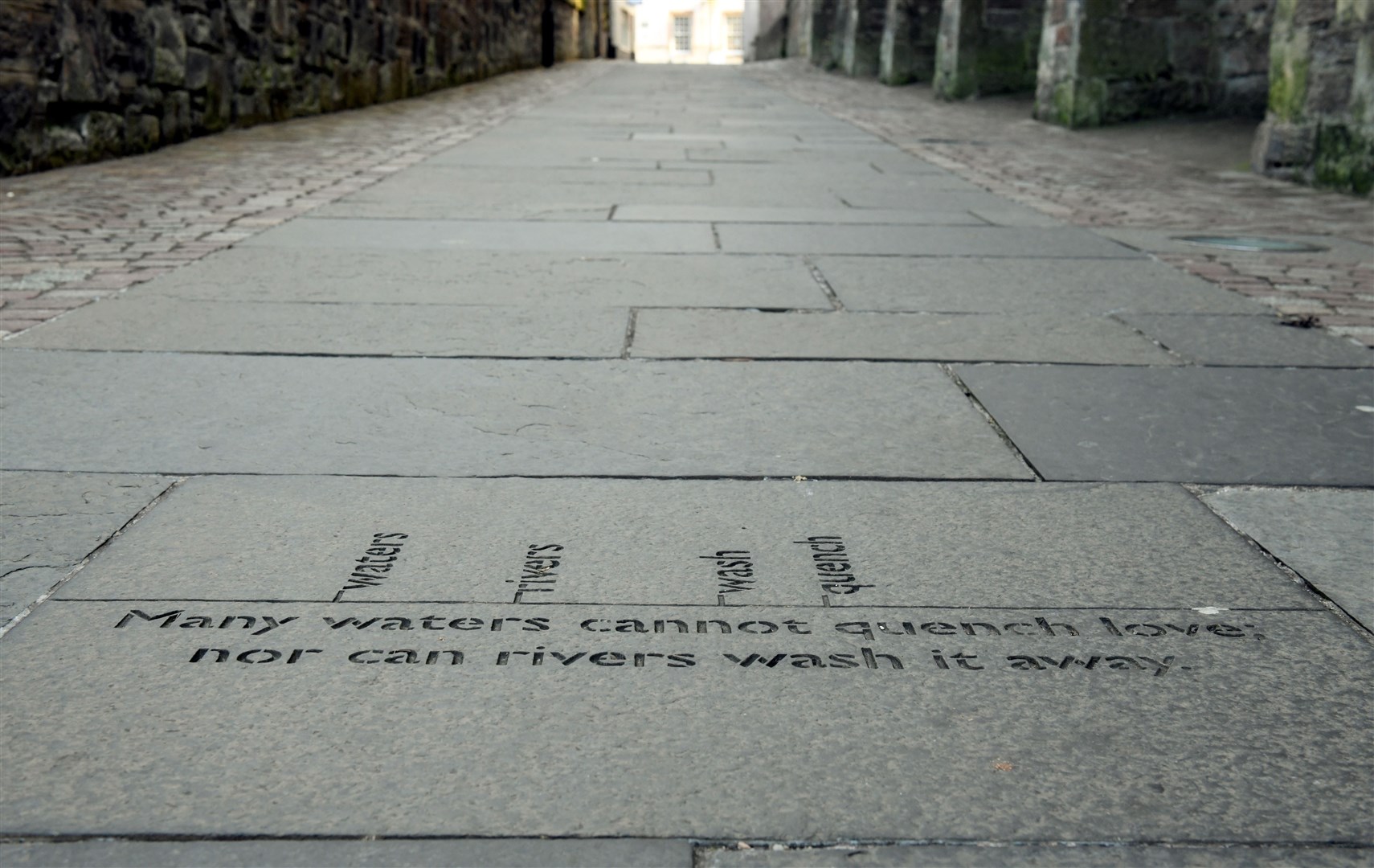 Songs of Solomon 8:7 verse on the ground on Church Lane Picture: James Mackenzie