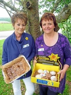 Jackie Sutherland and Tina Swanson make a tasty delivery in Dingwall! The Marie Curie mobile homebakes idea targets workplaces in Mid Ross.