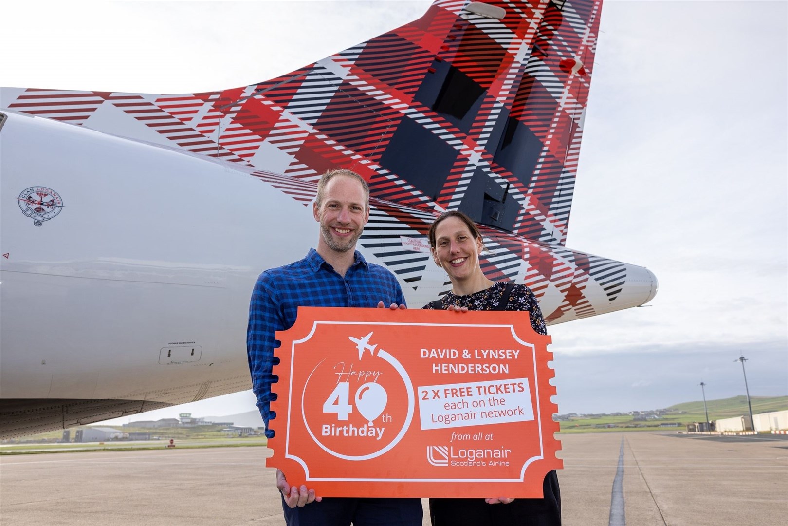 Twins David and Lynsey Henderson receiving 40th birthday wishes from Loganair.