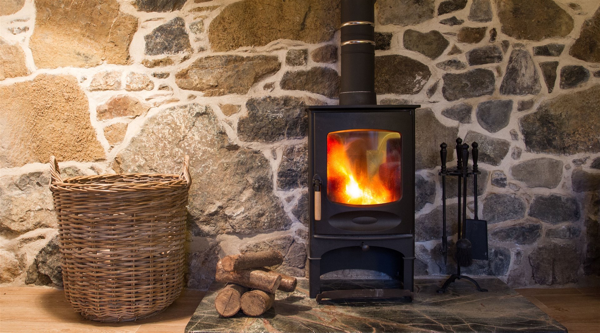 A wood burning stove. There has been widespread confusion over which properties are exempt from a new ban on their installation, with many Highlanders and islanders reliant on them as a heating source.