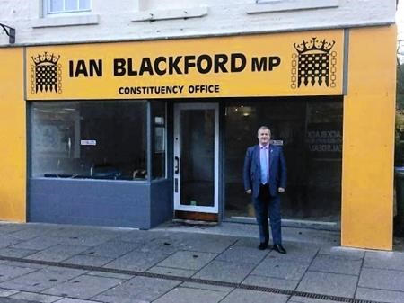 Ian Blackford MP, pictured, has now removed the two yellow side panels from the Dingwall constituency office after complaints from a local resident.