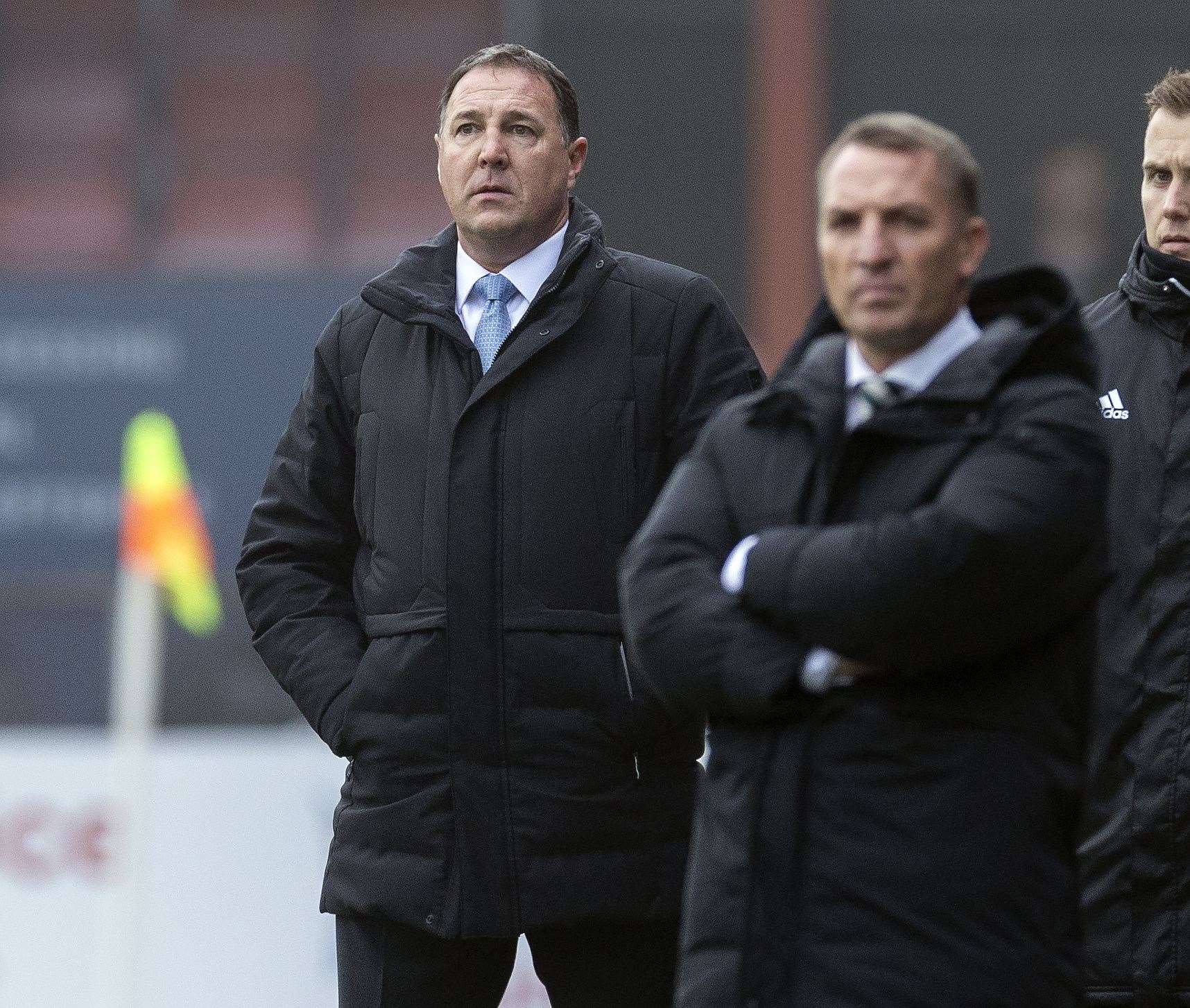 Malky Mackay and Celtic manager Brendan Rodgers during his penultimate match in charge