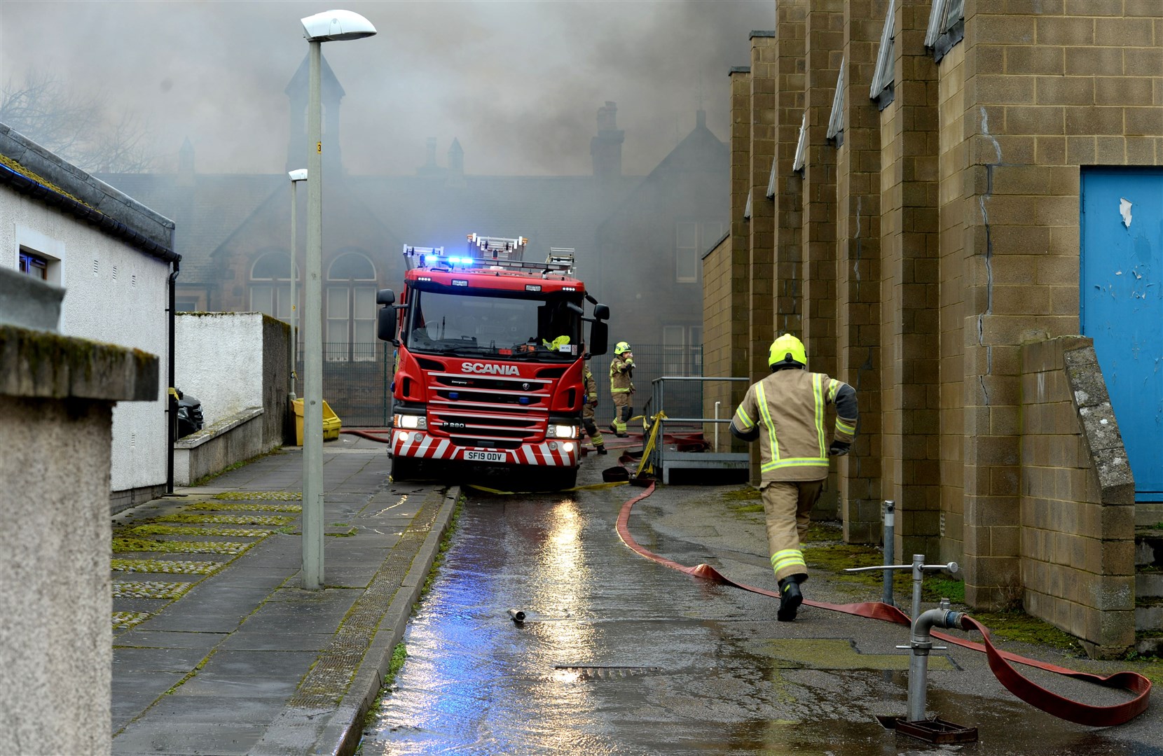 Smoke billowing above Park Primary School during the fire. Picture: James MacKenzie.