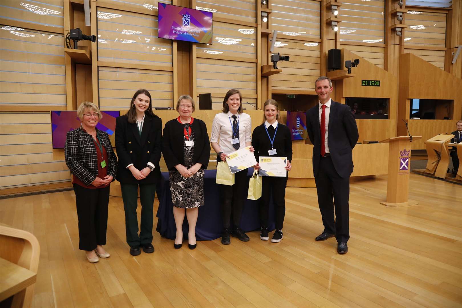 Pictured (left to right) are Liz Campbell (Law Society Executive Director of Education, Training and Qualifications), Georgia Turnbull (Law Society Careers and Outreach Coordinator), Sheila Webster (Law Society Deputy President), Aimee Ross, Orla McMichael and Deputy Presiding Officer Liam McArthur MSP.