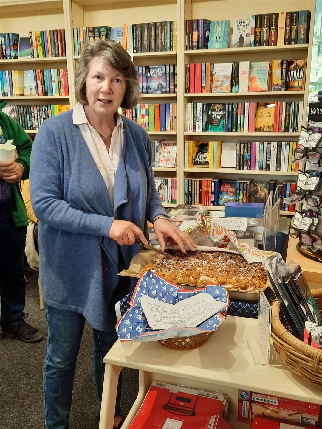 Owner Tina Thomson cut the birthday cake. Picture: Ullapool Bookshop