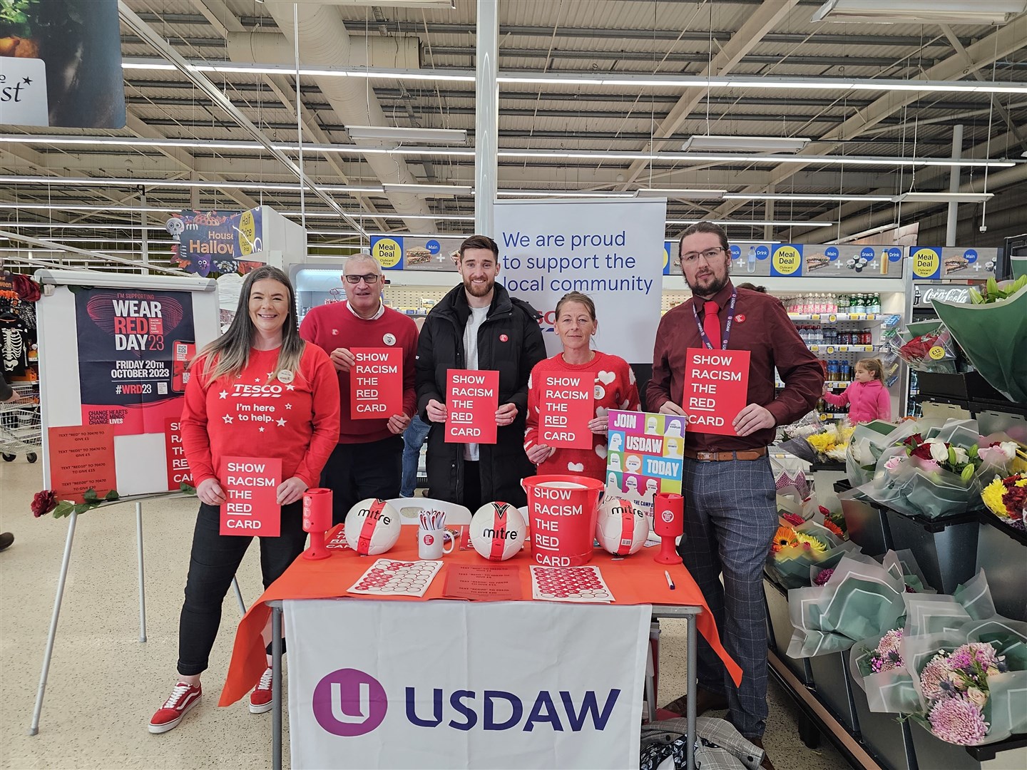 Ross County skipper Jack Baldwin offered his support to the Show Racism the Red Card campaign at Tesco in Dingwall in a team up woth Usdaw.