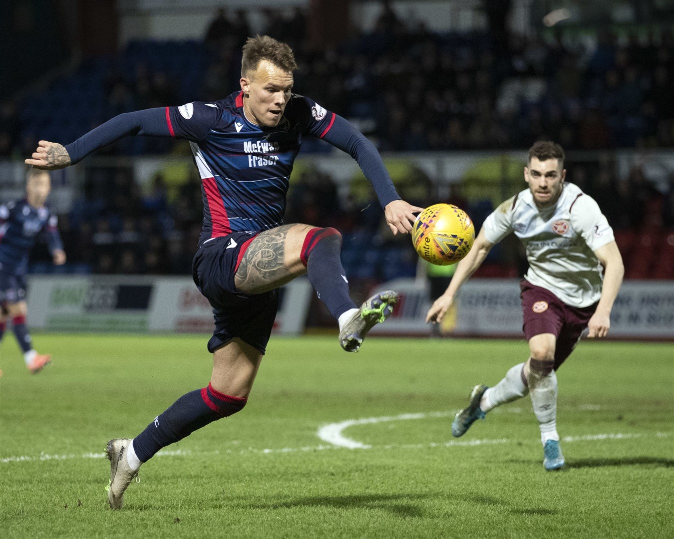 Lee Erwin in action for Ross County. Picture: Ken Macpherson