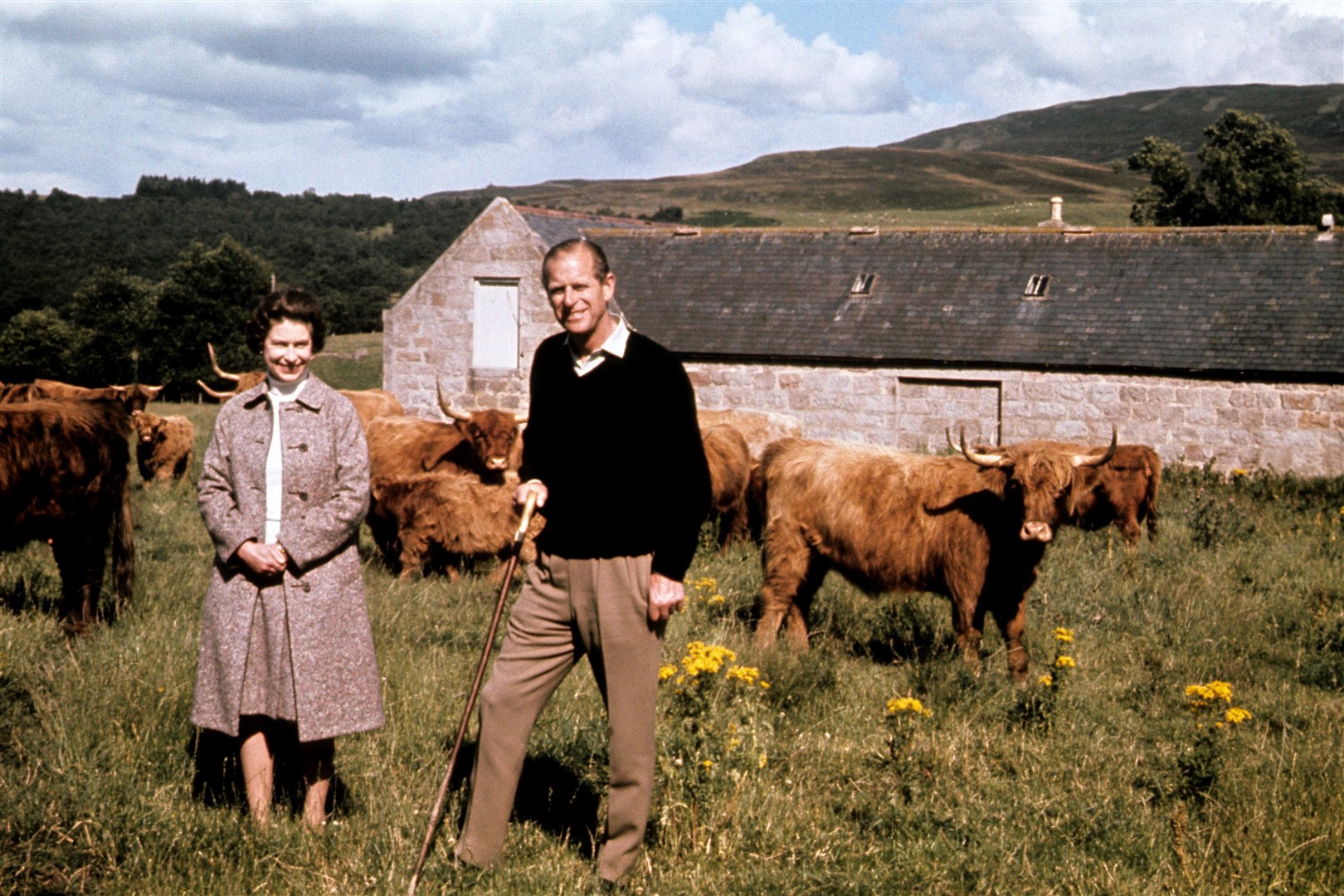 The Queen and the Duke of Edinburgh during a visit to a farm on their Balmoral estate, to celebrate their silver wedding anniversary (PA)