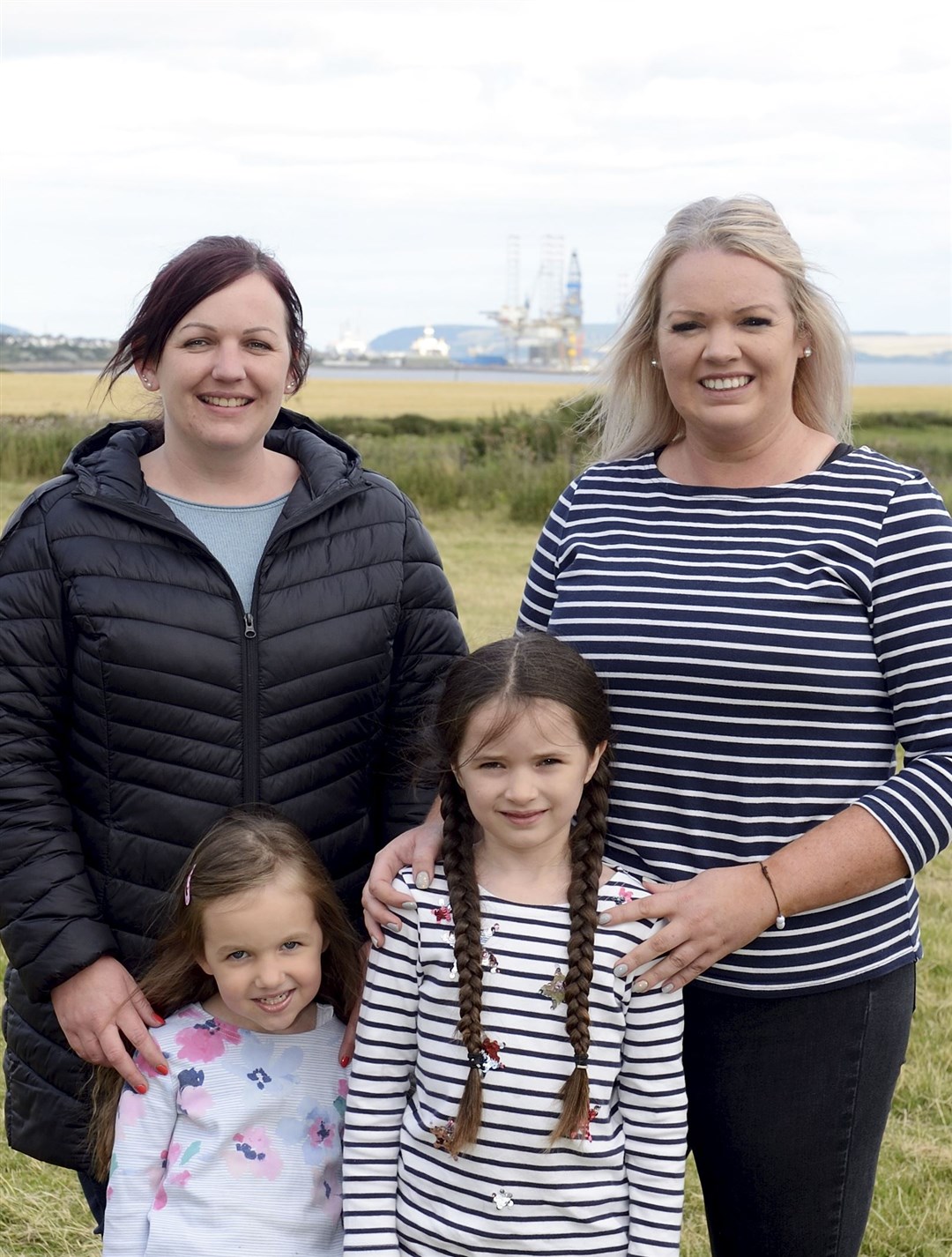 Jennie Wilson, Katie Christie, Aimee Grant (4) and Lucy Christie (6) on the land that is going to be used for the family business on Dalmore Farm. Picture: James Mackenzie