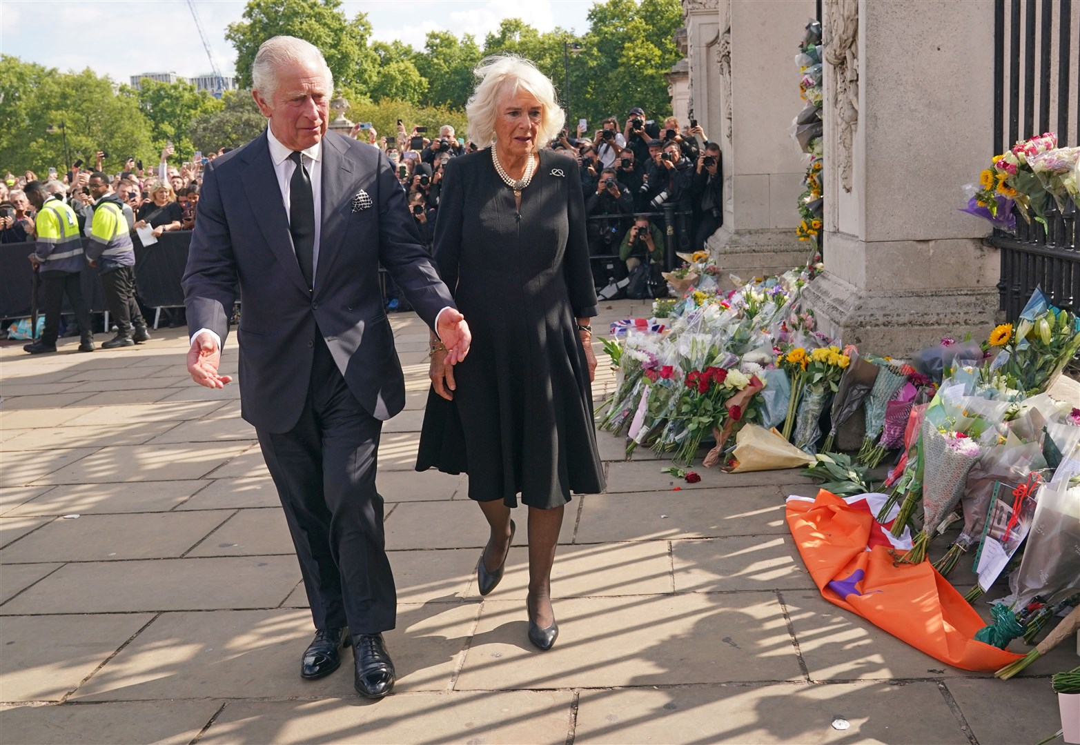Camilla was by the King’s side as he viewed tributes to his late mother, the Queen, outside Buckingham Palace on Friday (Yui Mok/PA)