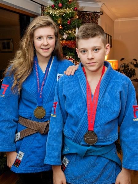 Aimee and Jack Grant show off their medals. Picture: Ian Rhind.