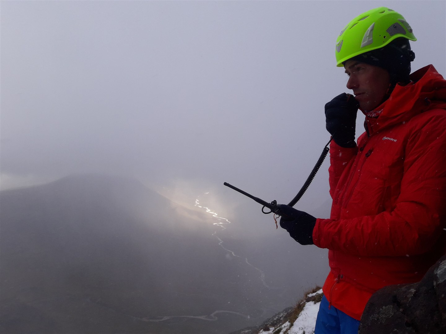 A member of the Dundonnell mountain rescue team using one of the new radios on An Teallach. Picture: Dundonnell MRT
