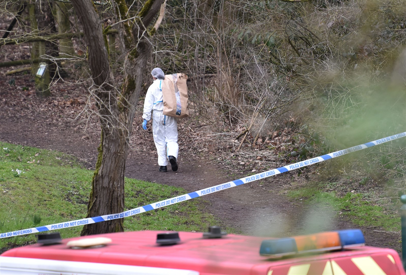 A police forensic officer at the scene in Culcheth Linear Park (Peter Powell/PA)