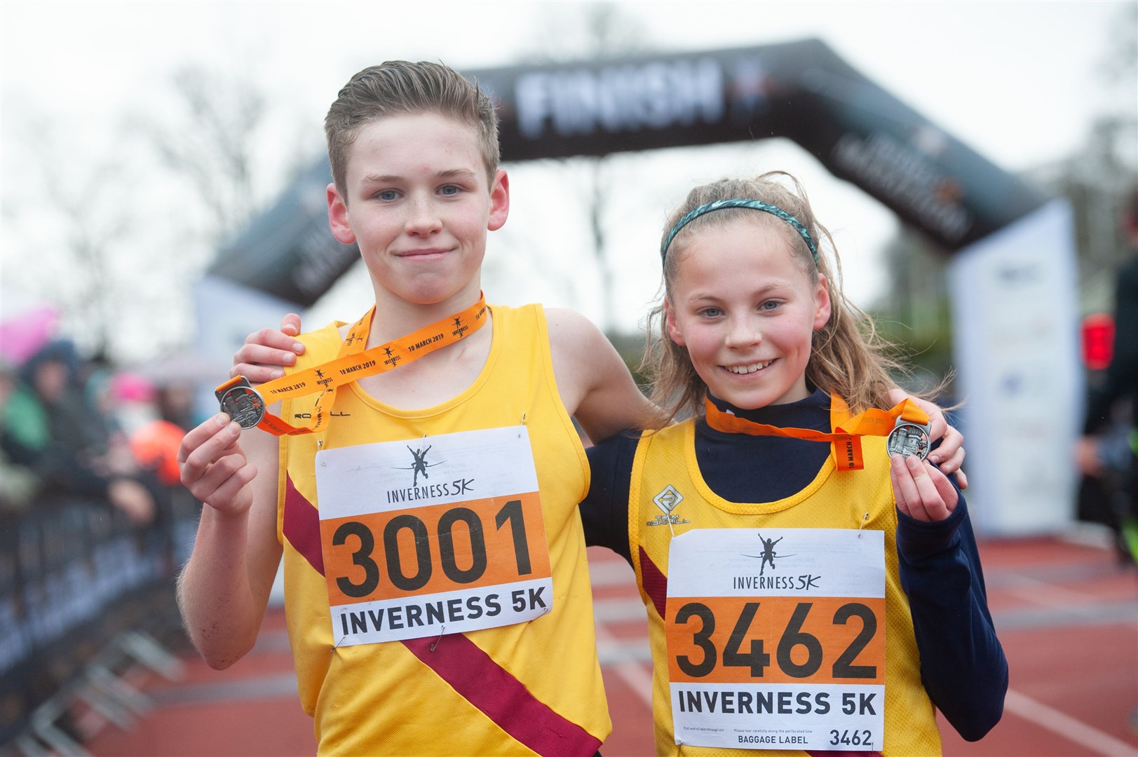 Lucas and Anna Cairns celebrate winning at the Inverness 5k.