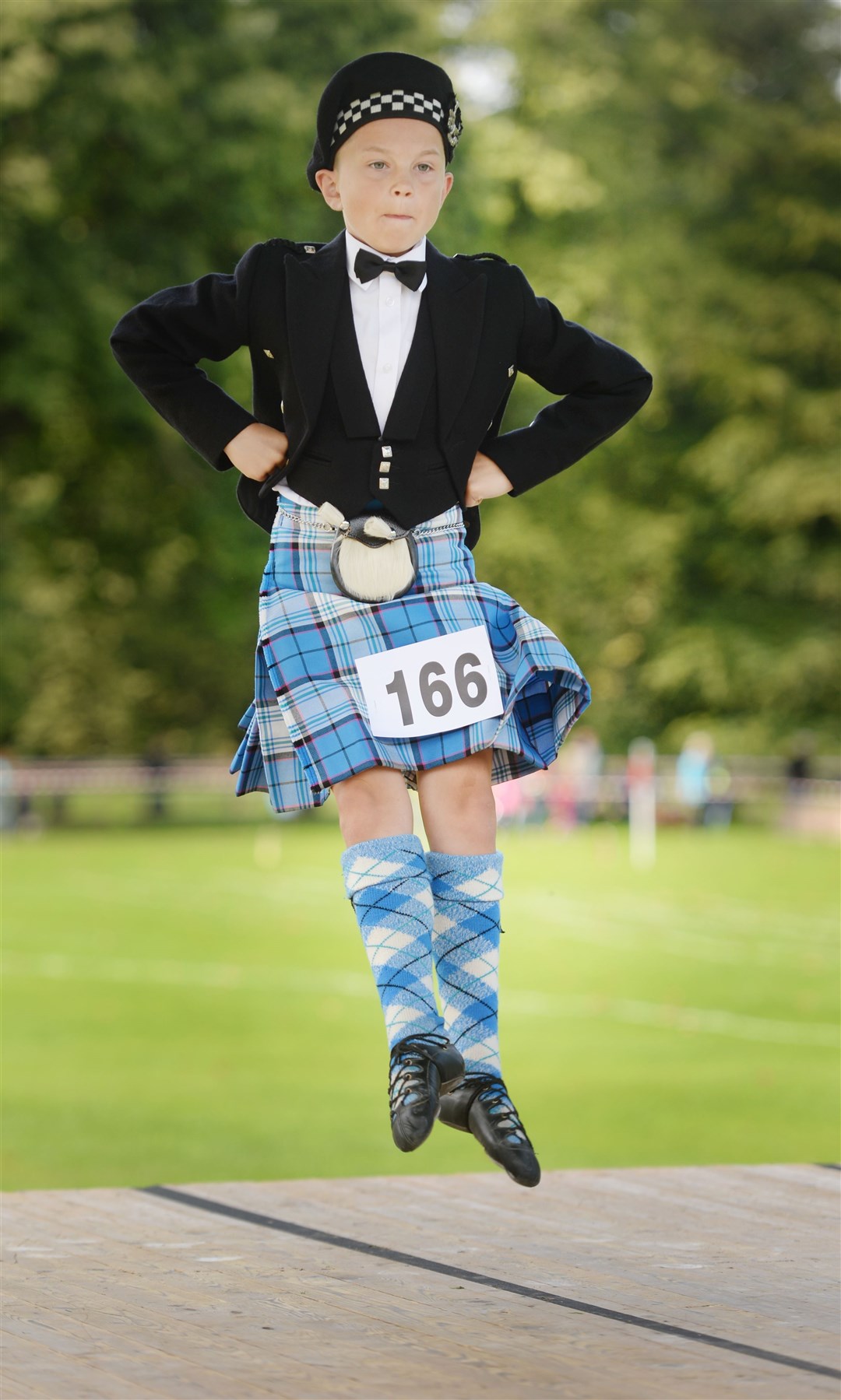 BETTER DAYS: Dance competitor Innes Mackenzie of Fearn going through a routine at a previous Strathpeffer Highland Gathering. Picture: Gair Fraser