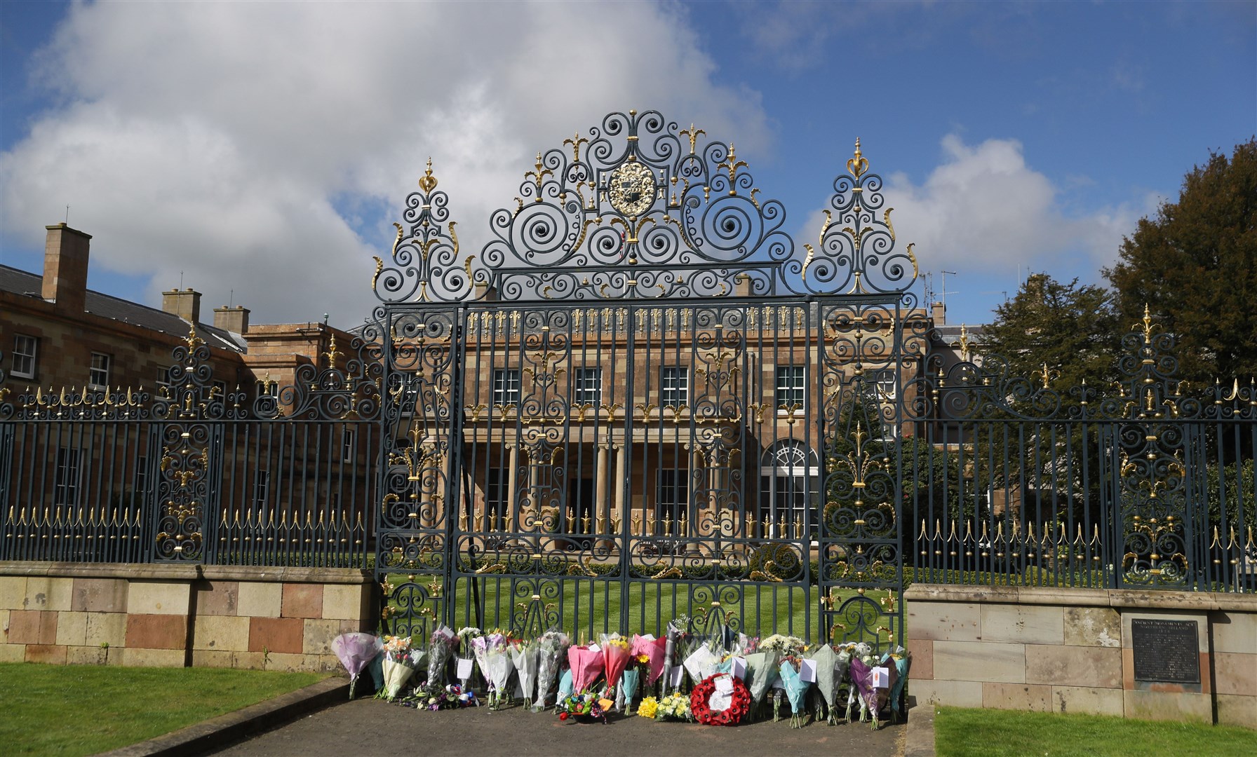 Flowers left at the gates of Hillsborough Castle, Northern Ireland (Brian Lawless/PA)