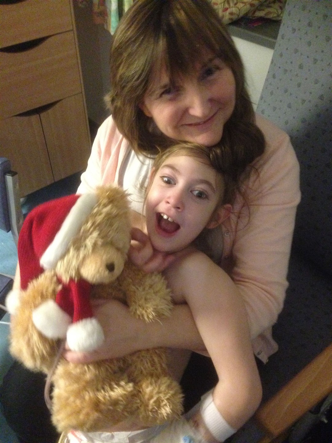 Zoë and mum Heather after one of her many operations in Royal Aberdeen Children’s Hospital.