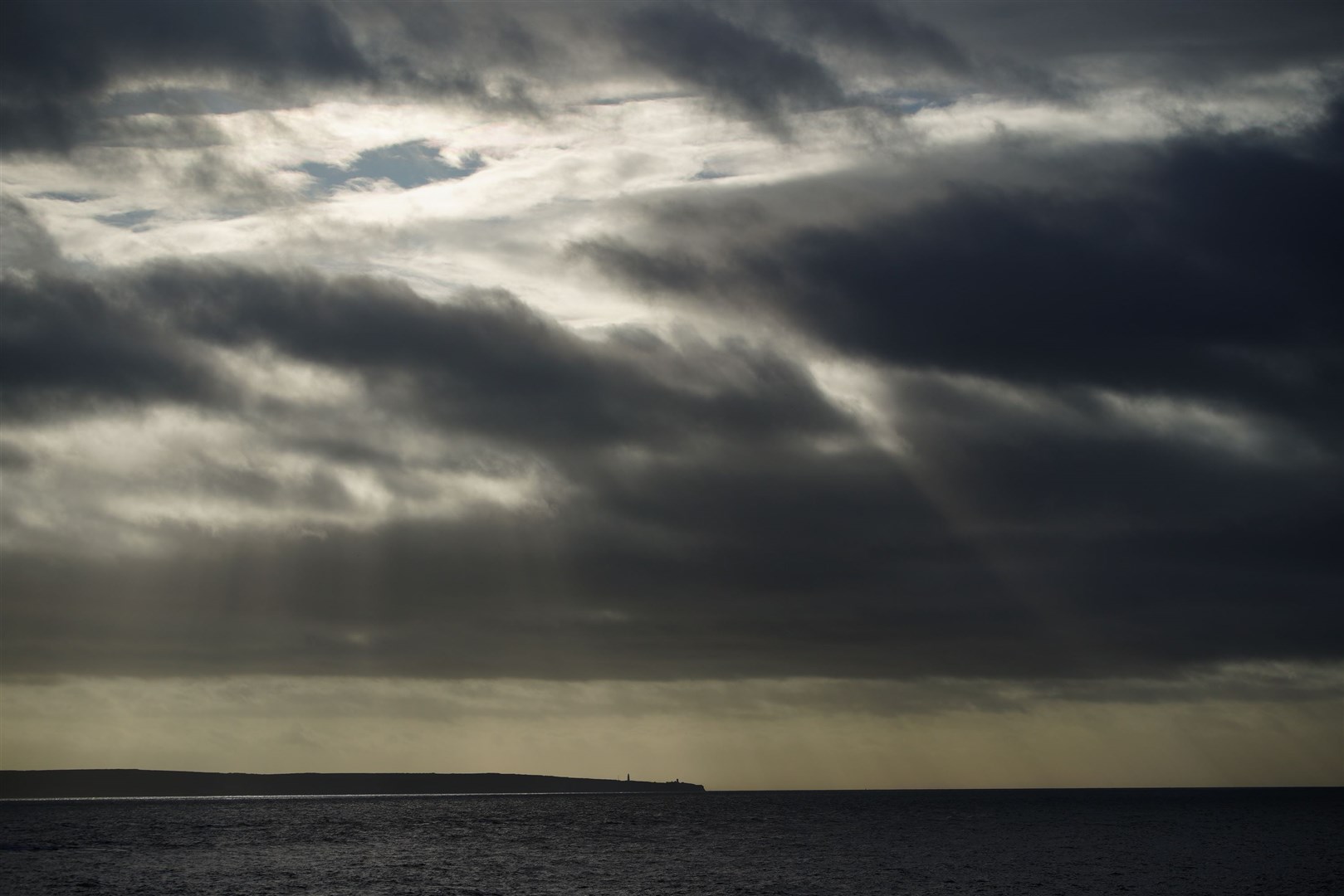 Clouds gathering in Porthcawl in south Wales (Ben Birchall/PA)