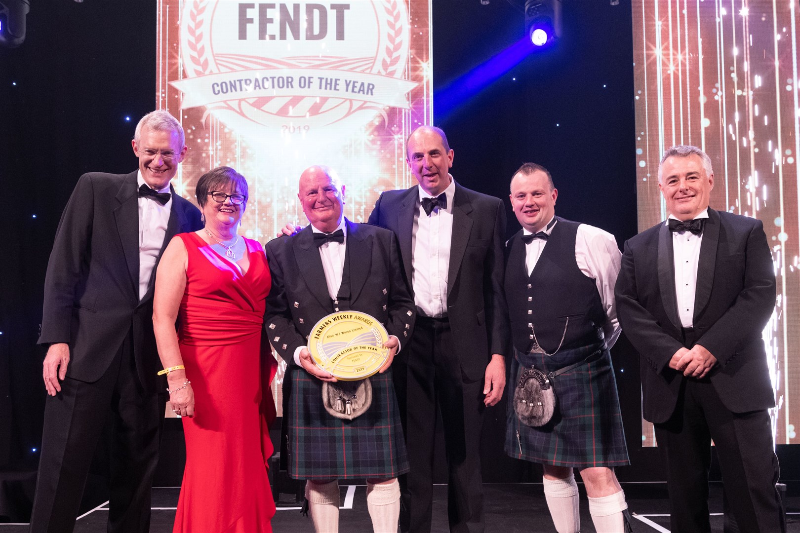 From left, Jeremy Vine presenter and broadcaster, Alyson Wilson, Allan Wilson,Martin Haymer from the sponsors Fendt, Stuart Wilson and Karl Schneider, editor of the Farmers Weekly.